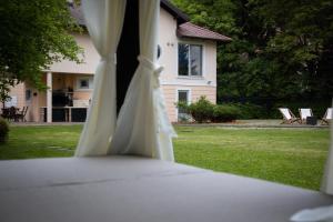 a close up of a white tent in a yard at Great Lane house in Sarajevo