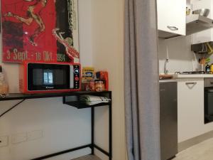 Kuchyňa alebo kuchynka v ubytovaní Adam Apartment