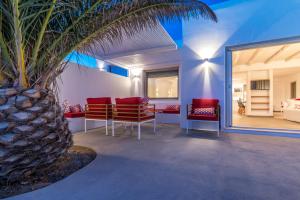 Uma área de estar em O Lofos Luxury Boutique Suites