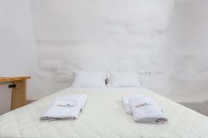 Postel nebo postele na pokoji v ubytování Anamar Kea Boutique