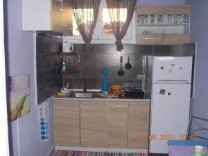 A kitchen or kitchenette at Marco's apartment