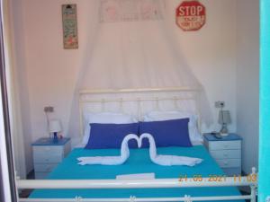 A bed or beds in a room at Marco's apartment