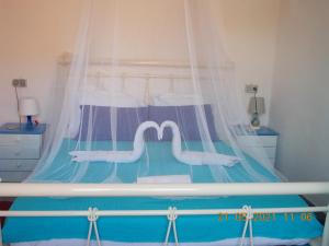 A bed or beds in a room at Marco's apartment