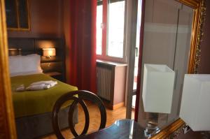 Posteľ alebo postele v izbe v ubytovaní Sweet Home Parioli