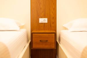 Postel nebo postele na pokoji v ubytování sofia's cozy rooms