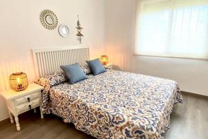 A bed or beds in a room at Apartamento espectacular cerca de la playa