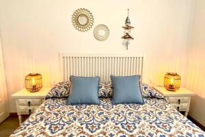 A bed or beds in a room at Apartamento espectacular cerca de la playa