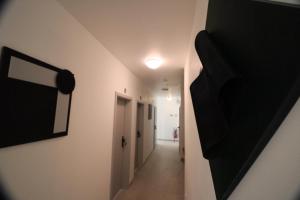 Televízia a/alebo spoločenská miestnosť v ubytovaní Vincanto Rooms Old Town