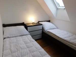 Postel nebo postele na pokoji v ubytování Apartmánový Penzión Bojnice