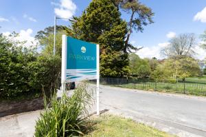 a sign for a pharmacy on the side of a road at Park View in Falmouth