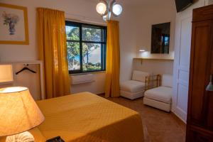 A bed or beds in a room at B&b Giglio di Mare