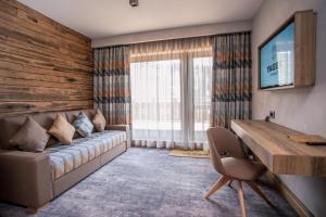 TV a/nebo společenská místnost v ubytování Yager Chalet