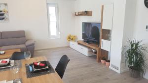 TV a/nebo společenská místnost v ubytování Savršen odmor u Villa Ivona