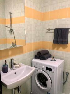 Ett badrum på Vezas Apartment 3beds