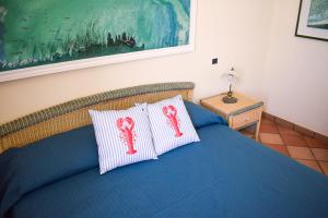Säng eller sängar i ett rum på Mogaver - Rooftop Apartment Leuca SIT