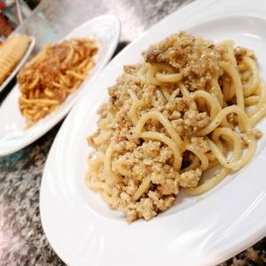a plate of food with pasta on a table at Hotel Reali in Chianciano Terme