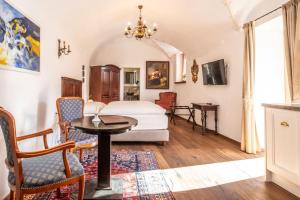 Televízia a/alebo spoločenská miestnosť v ubytovaní Stammhaus - Premium Residences