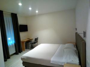 Posteľ alebo postele v izbe v ubytovaní Hotel Cantaleone