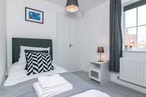 Ein Bett oder Betten in einem Zimmer der Unterkunft Cunningham Lodge