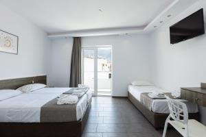 Posteľ alebo postele v izbe v ubytovaní Kahlua Boutique Hotel