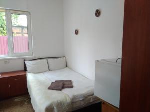 Posteľ alebo postele v izbe v ubytovaní Kak v gostinice