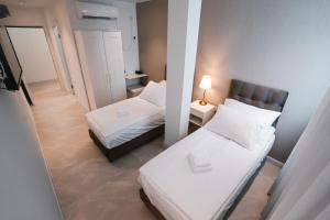 Unique Hotel Ashdod客房内的一张或多张床位