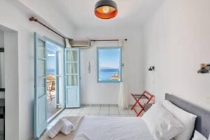 A bed or beds in a room at APOLLON PALACE