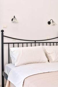 A bed or beds in a room at APOLLON PALACE