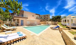 a villa with a swimming pool and a house at Allas Villa Heated Pool in Chania Town