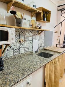 A kitchen or kitchenette at Casa El calado