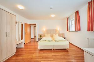 Postel nebo postele na pokoji v ubytování Hotel-Gasthof Bub