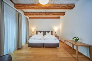 Postel nebo postele na pokoji v ubytování Hotel-Gasthof Bub