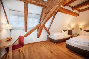 Postel nebo postele na pokoji v ubytování Hotel-Gasthof Bub