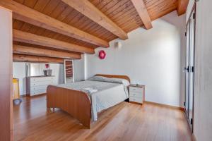 Ein Bett oder Betten in einem Zimmer der Unterkunft Splendida Villa con Piscina