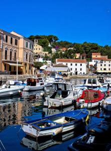 a group of boats are docked in a harbor at Apartments VESNA (63) in Veli Lošinj +48 photos