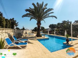 Bazén v ubytovaní Villa Delfin, 3 tolle Apartements für je 4 bis 6 Personen - in L Alfàs del Pi alebo v jeho blízkosti