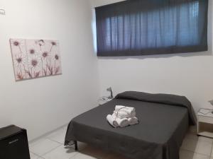 A bed or beds in a room at B&b il Girasole