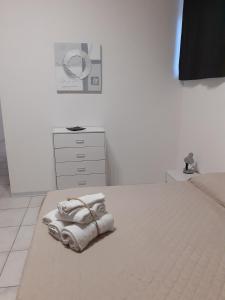 A bed or beds in a room at B&b il Girasole