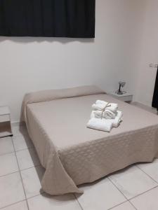 A bed or beds in a room at B&b il Girasole