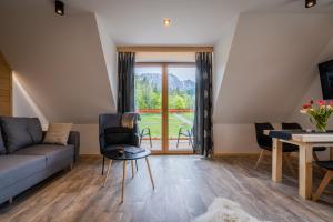 Posedenie v ubytovaní Biały Miś Apartamenty Art & Design