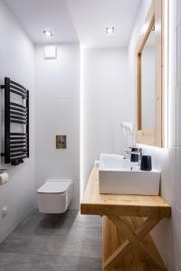 Kúpeľňa v ubytovaní Biały Miś Apartamenty Art & Design