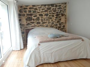 Кровать или кровати в номере Charmant logement T2 à 2 pas de la mer