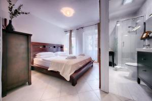 Postel nebo postele na pokoji v ubytování B&B Villa Vis