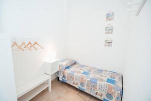 Posteľ alebo postele v izbe v ubytovaní MOROLAin