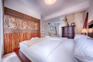 Ένα ή περισσότερα κρεβάτια σε δωμάτιο στο B&B Villa Vis