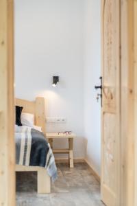 Posteľ alebo postele v izbe v ubytovaní Biały Miś Apartamenty Art & Design