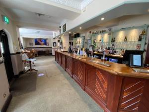 El salón o zona de bar de The Plough Inn Wigston