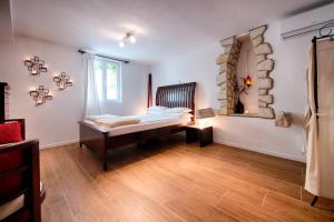 Postel nebo postele na pokoji v ubytování B&B Villa Vis