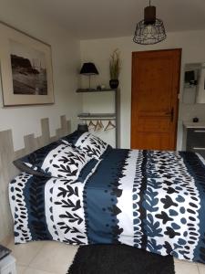 Posteľ alebo postele v izbe v ubytovaní LA GRIOTTE 2 & Spa&Piscine