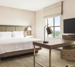 Postel nebo postele na pokoji v ubytování Snoqualmie Inn by Hotel America
